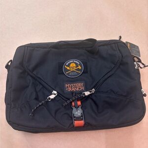 MYSTERY RANCH Black and Orange 3 way expandable briefcase